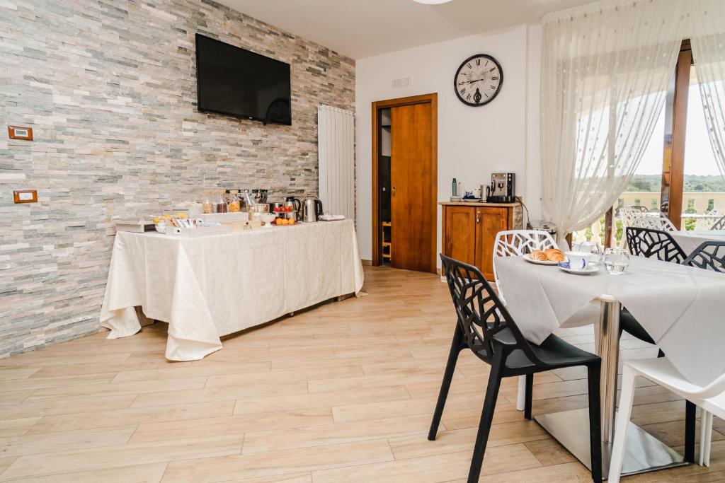 TV a/nebo společenská místnost v ubytování Holiday Gli Archi