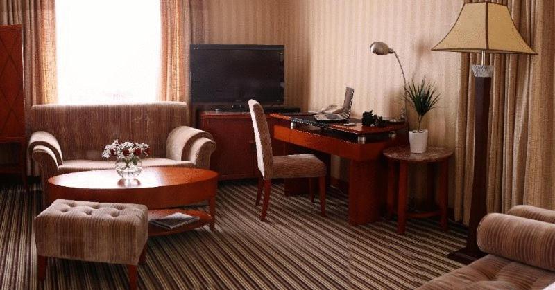 TV a/nebo společenská místnost v ubytování Hotel Park Exclusive
