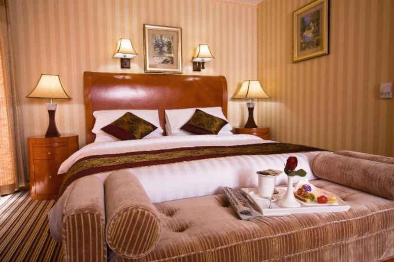 Postel nebo postele na pokoji v ubytování Hotel Park Exclusive