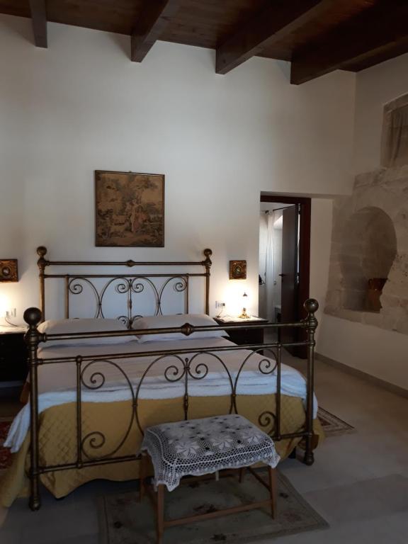 Postel nebo postele na pokoji v ubytování B&B Salita Delle Pere