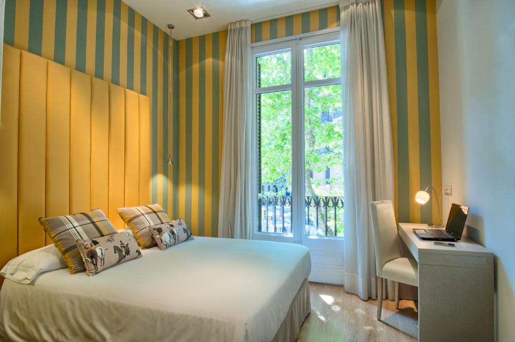 Postel nebo postele na pokoji v ubytování BacHome Terrace B&B