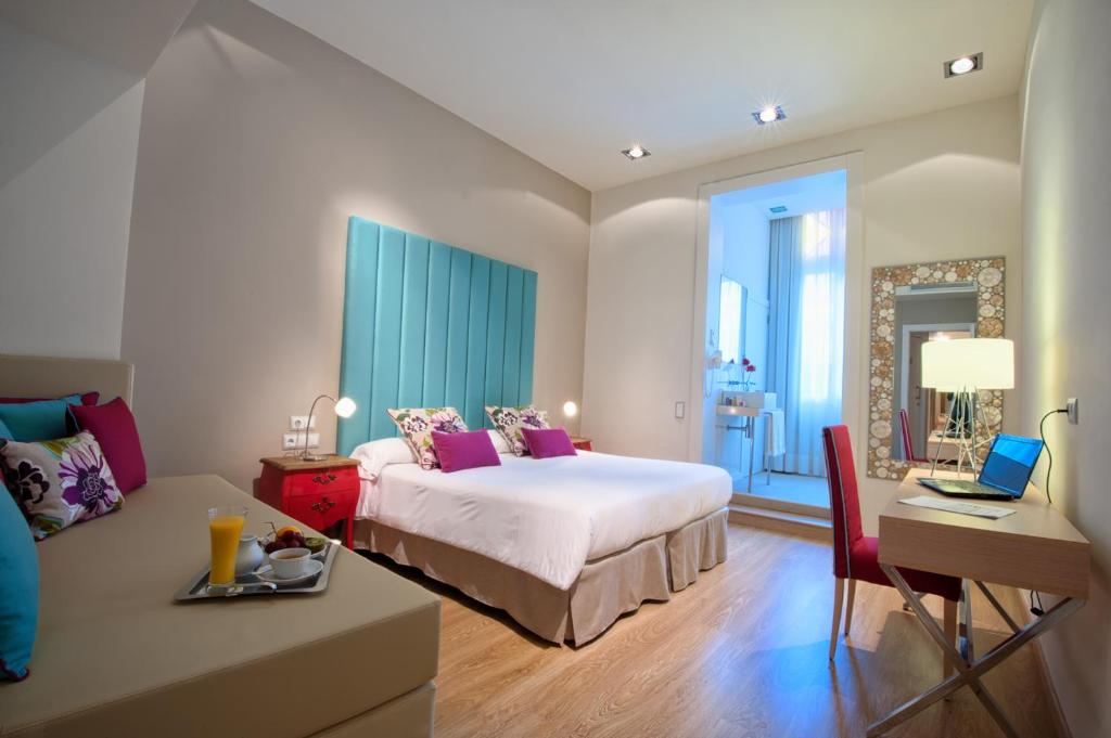 Postel nebo postele na pokoji v ubytování BacHome Terrace B&B