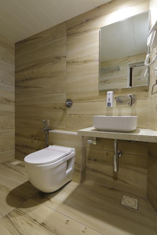 Koupelna v ubytování Hotel Elysian Residency