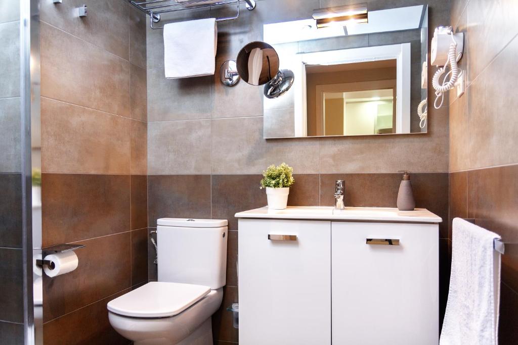 Kúpeľňa v ubytovaní Feelathome Plaza Apartments