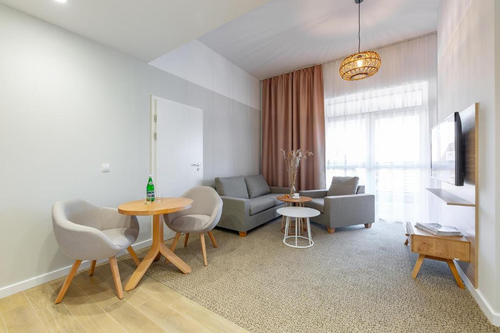 Telewizja i/lub zestaw kina domowego w obiekcie Molo Park Aparthotel