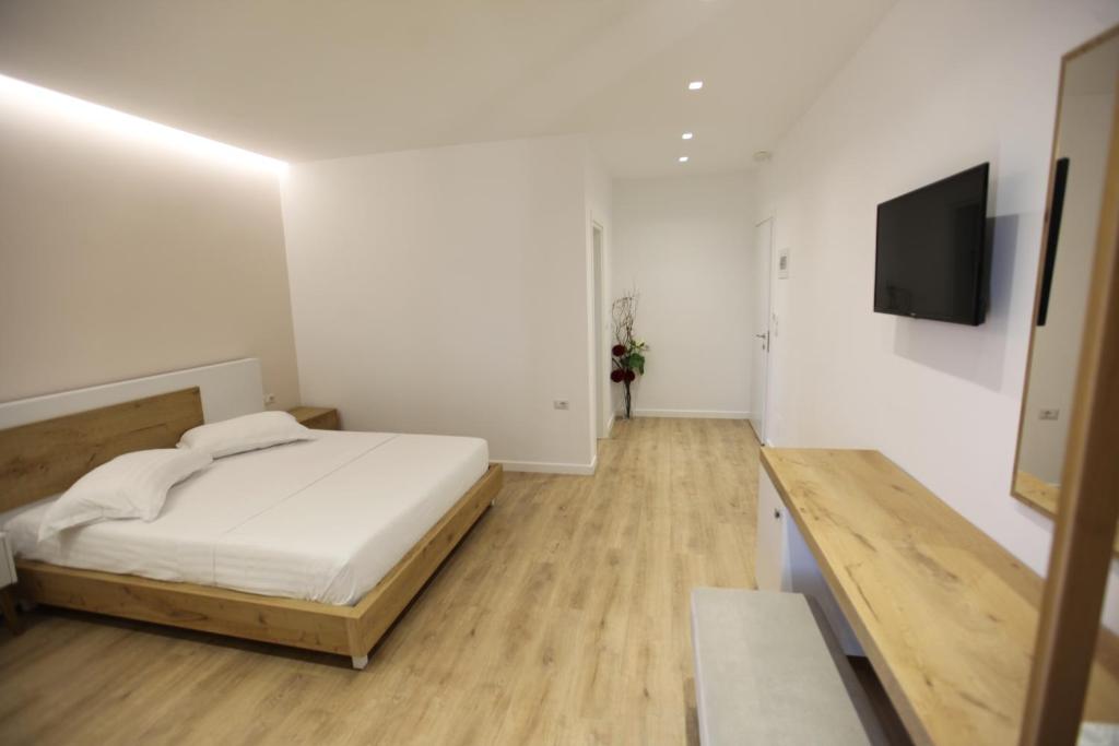 Postel nebo postele na pokoji v ubytování Sea Breeze Villa
