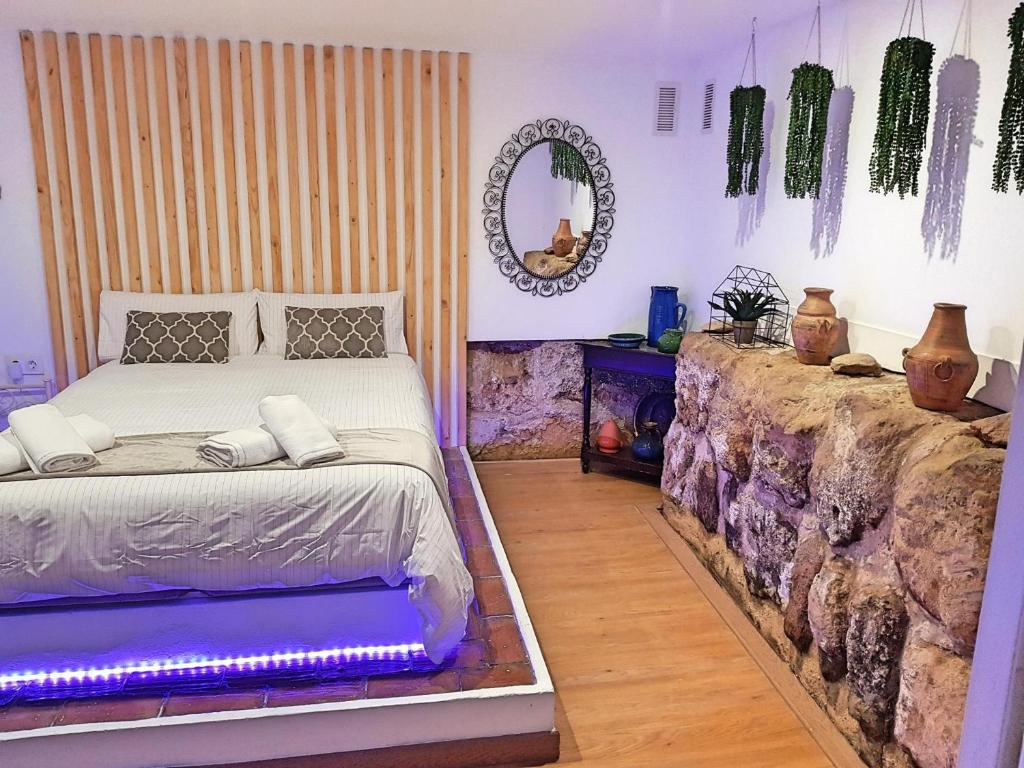 Postel nebo postele na pokoji v ubytování Duplex juderia de Cordoba