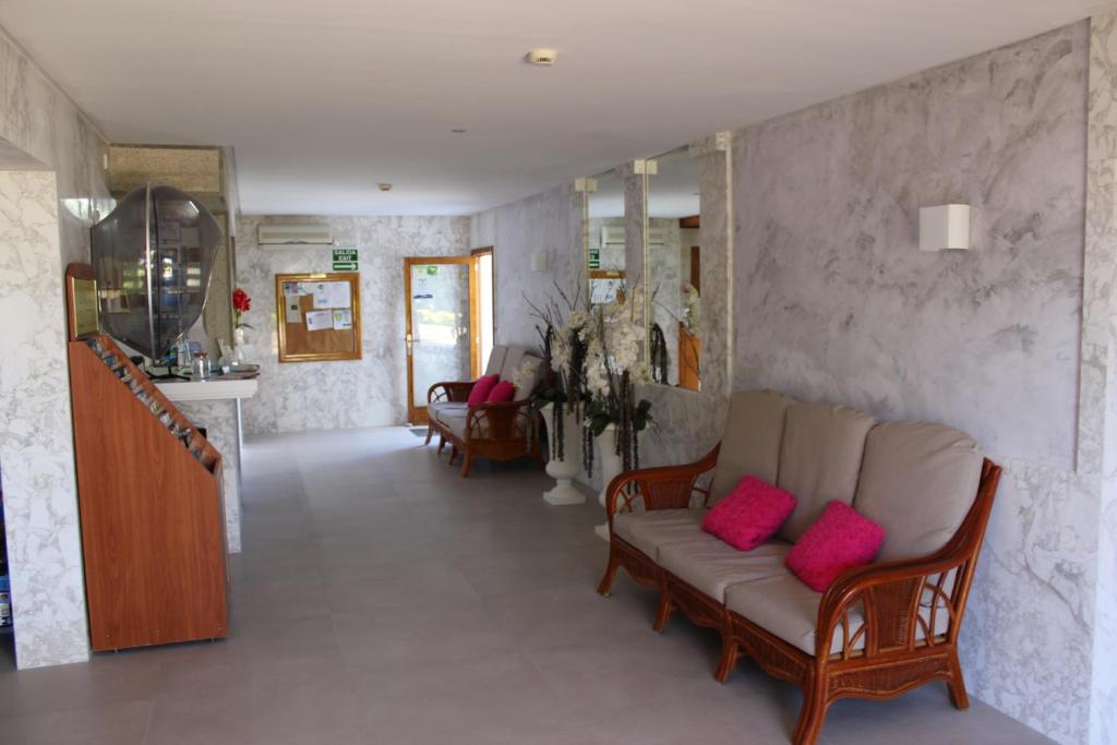 Posedenie v ubytovaní Apartamentos venecia a unos pasos de la playa