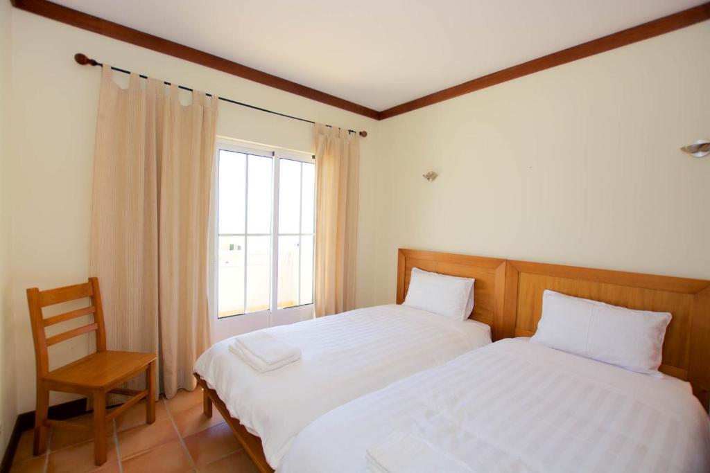 Postel nebo postele na pokoji v ubytování Casa Sol - Vista Mar - Praia Benagil