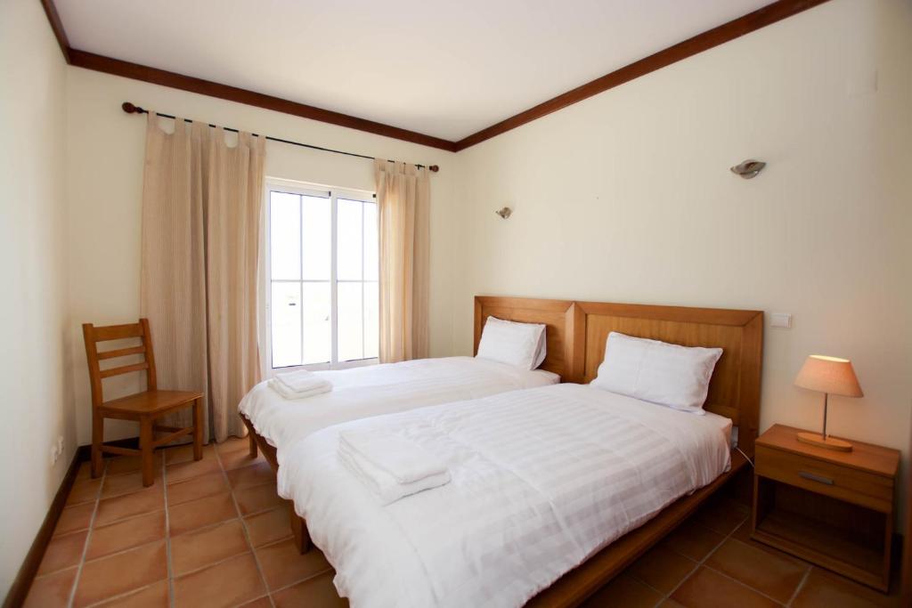 Postel nebo postele na pokoji v ubytování Casa Sol - Vista Mar - Praia Benagil