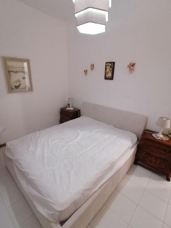 Posteľ alebo postele v izbe v ubytovaní Super terrazzo panoramico