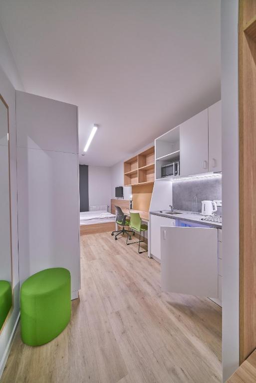 Kuchyňa alebo kuchynka v ubytovaní Apartamenty Collegia
