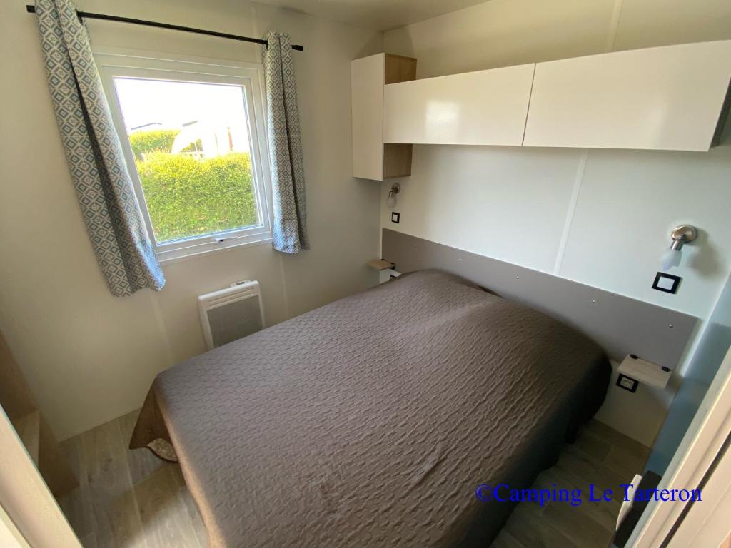 Postel nebo postele na pokoji v ubytování Camping Le Tarteron