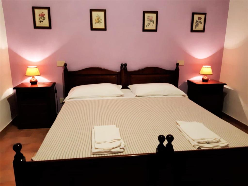 Postel nebo postele na pokoji v ubytování Agriturismo Malpasso