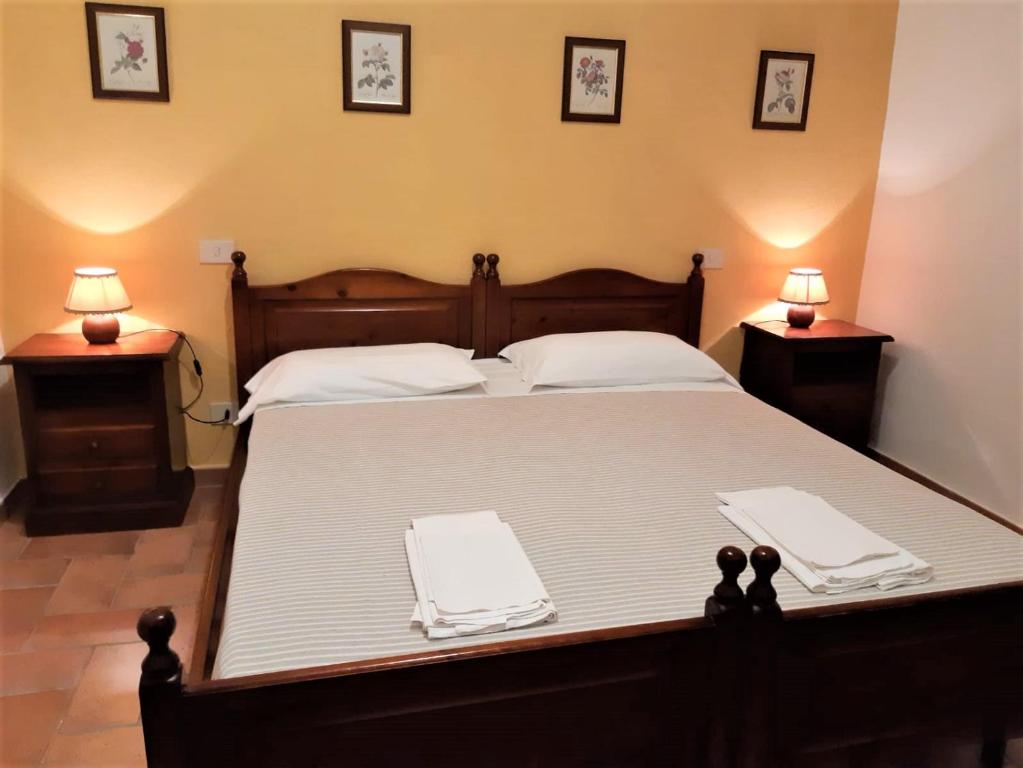 Postel nebo postele na pokoji v ubytování Agriturismo Malpasso