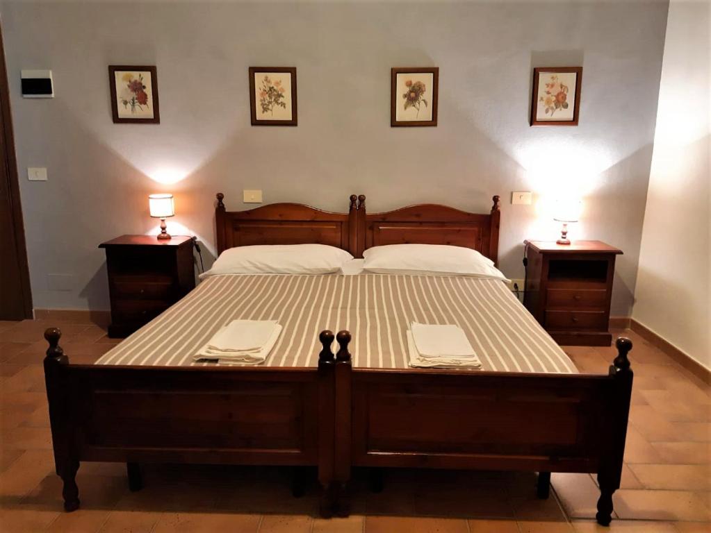 Postel nebo postele na pokoji v ubytování Agriturismo Malpasso
