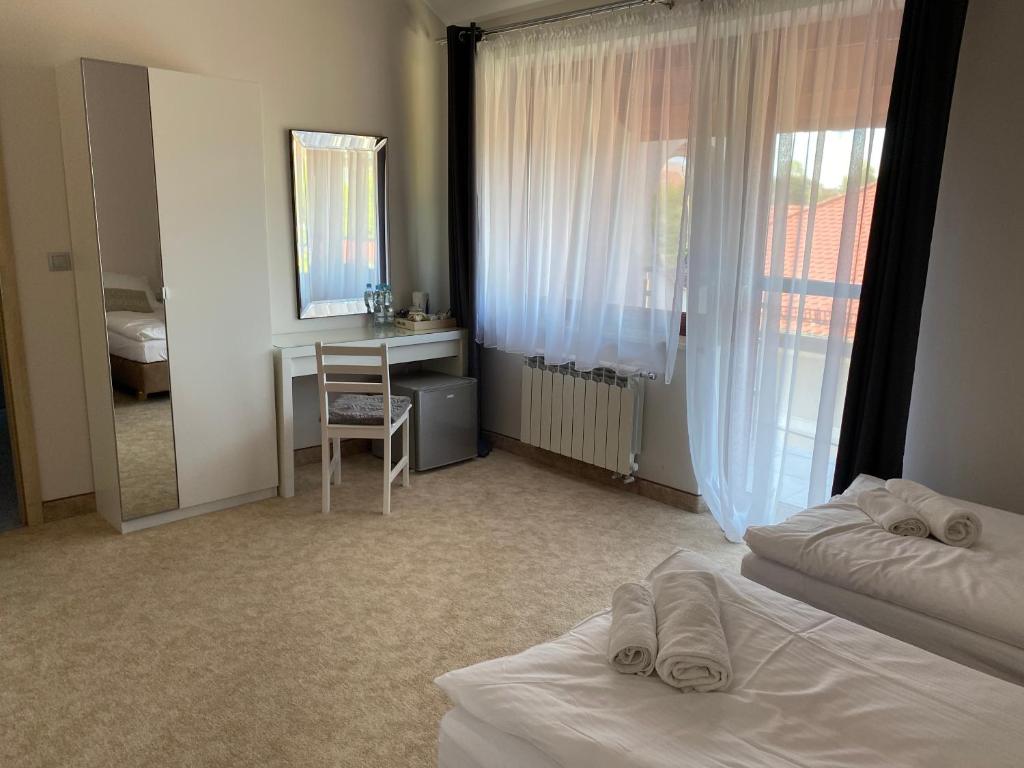 Postel nebo postele na pokoji v ubytování Villa Boja