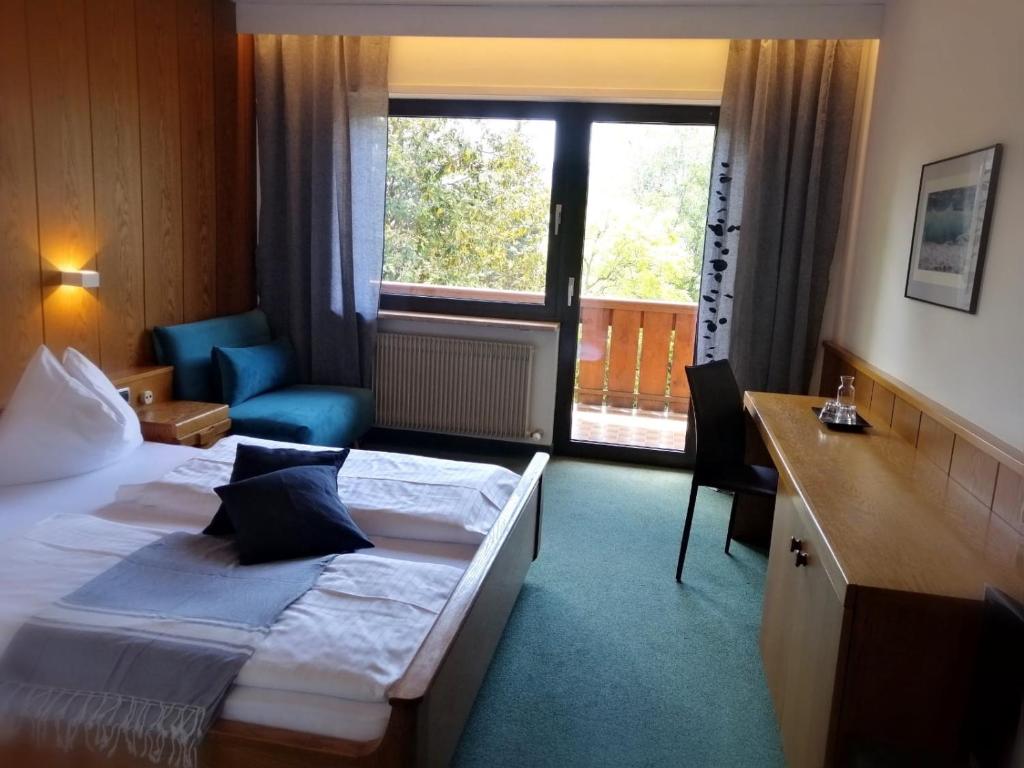 Postel nebo postele na pokoji v ubytování Hotel Schönbrunn