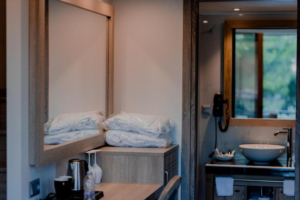 A bathroom at STORK Design Suites