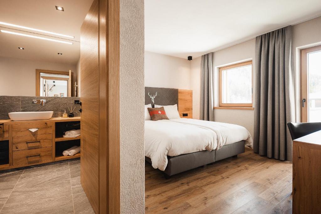 Rúm í herbergi á Avero Lodge