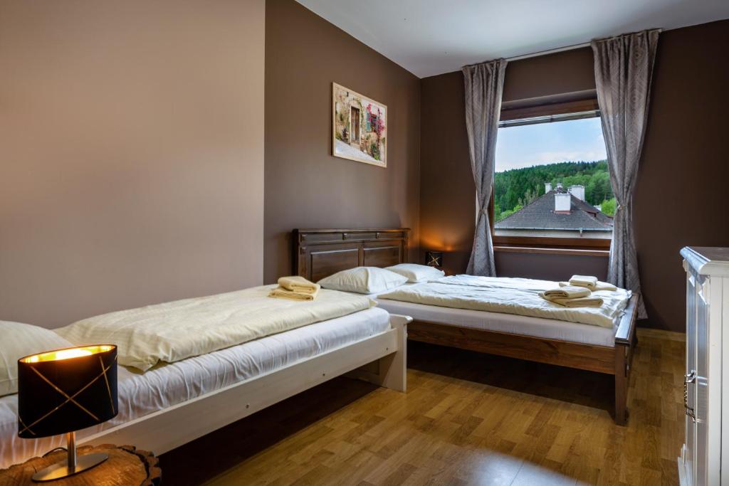 Posteľ alebo postele v izbe v ubytovaní Apartments Sofia