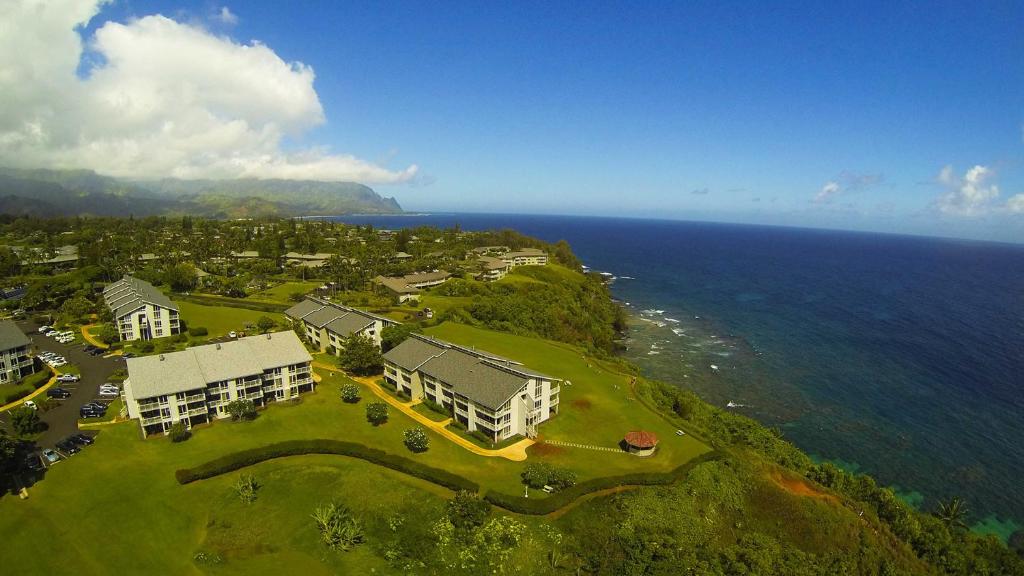 an aerial view of a resort near the ocean at The Cliffs at Princeville by VRHost in Princeville