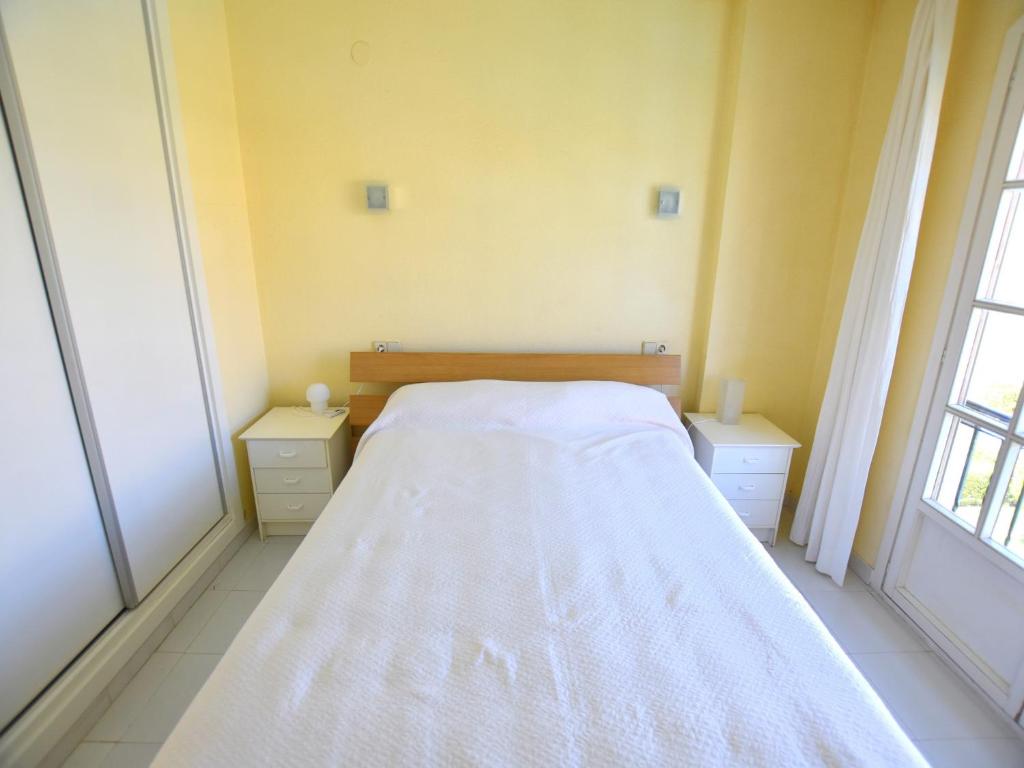 Posteľ alebo postele v izbe v ubytovaní Apartamento la Isla Javea - 5008