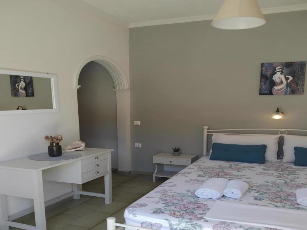 Postel nebo postele na pokoji v ubytování Rio Grande Rooms