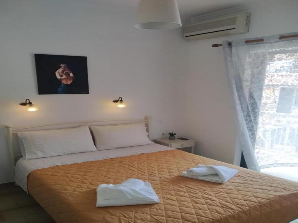 Postel nebo postele na pokoji v ubytování Rio Grande Rooms