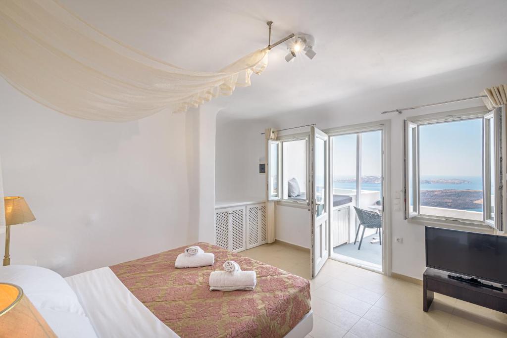 Postel nebo postele na pokoji v ubytování Avianto Suites