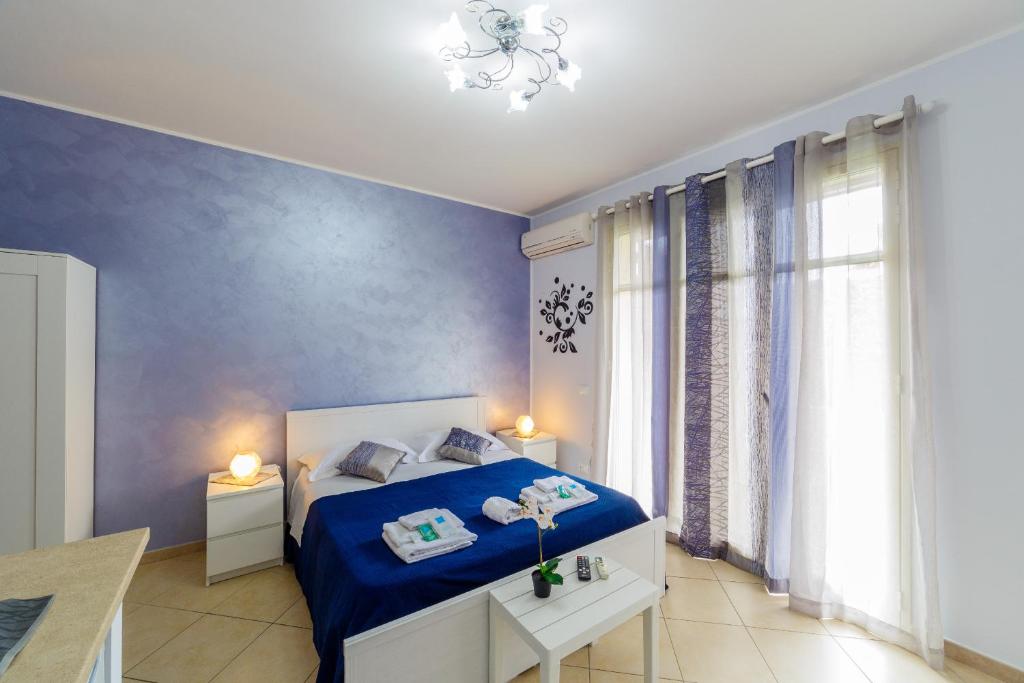 Posteľ alebo postele v izbe v ubytovaní Sicily in Love - Rooms & Breakfast