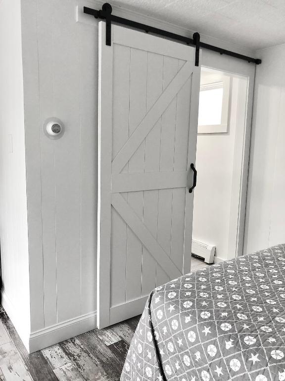 Postel nebo postele na pokoji v ubytování Kingfisher Lodging