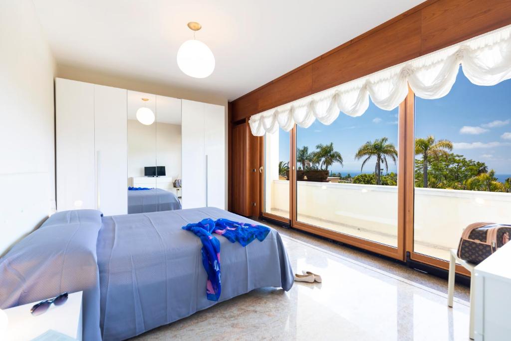 A bed or beds in a room at Villa Agave