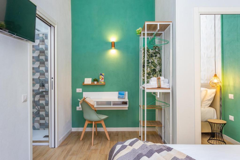 Posteľ alebo postele v izbe v ubytovaní Domus Laetitiae Rooms & Apartments