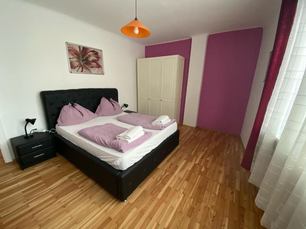 Posteľ alebo postele v izbe v ubytovaní Apartment Domino