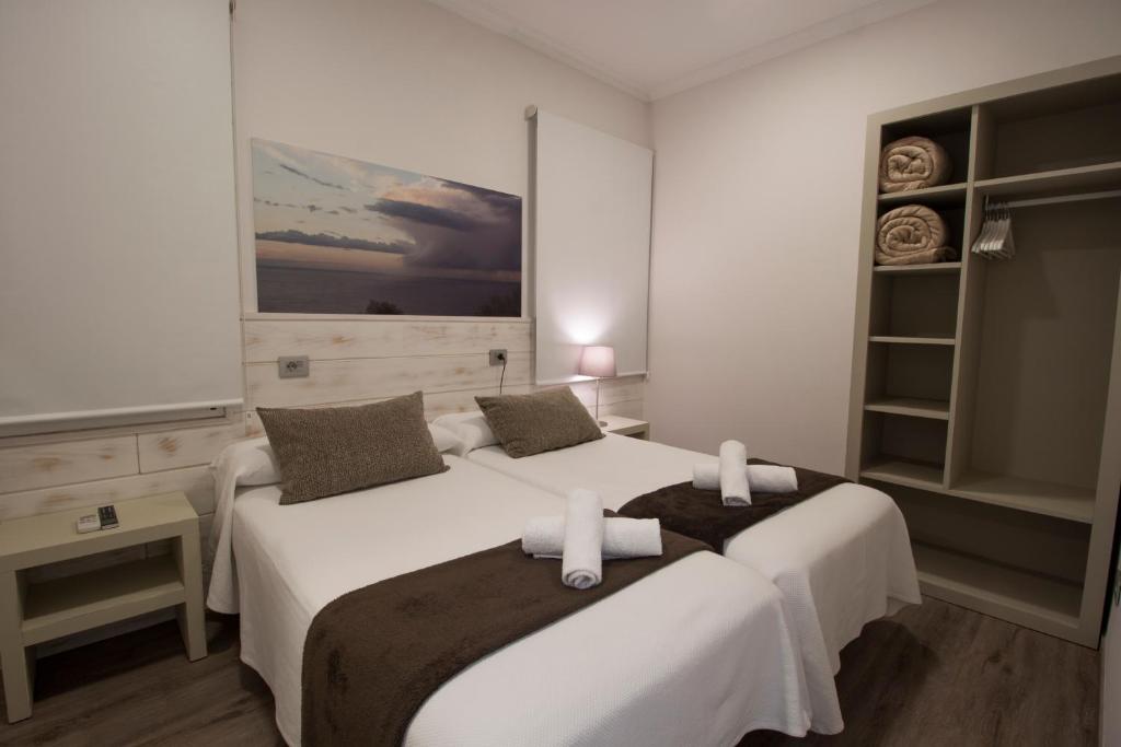 Cama o camas de una habitación en Pensión San Martin