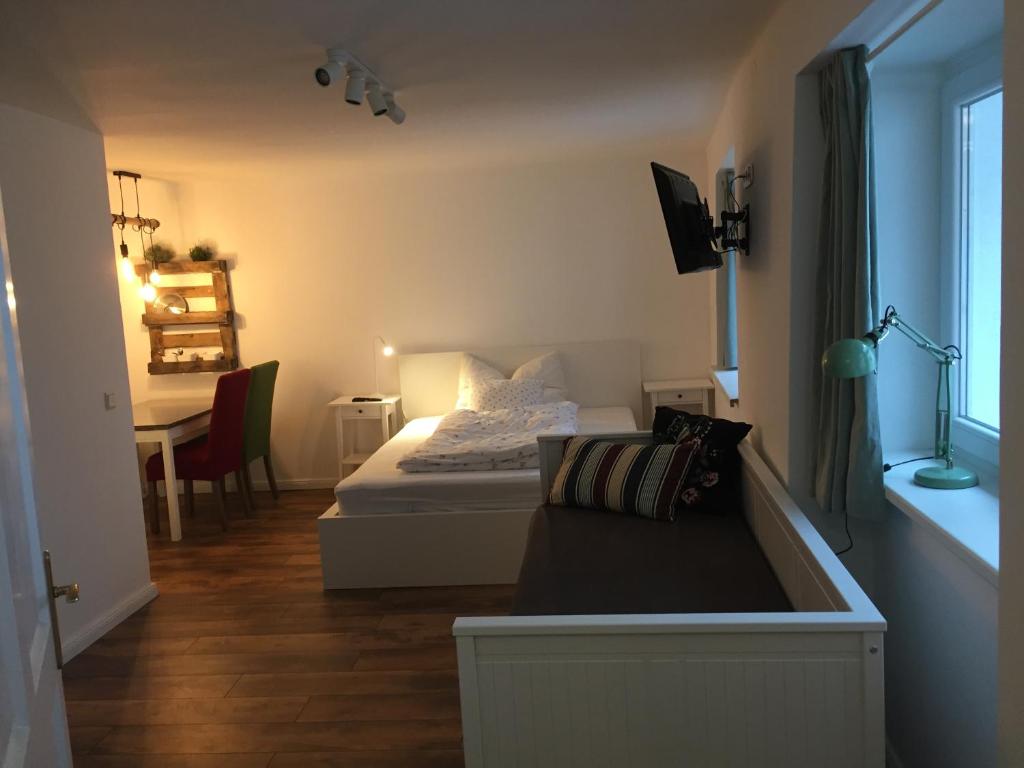Postel nebo postele na pokoji v ubytování Ferienwohnungen Neusiedl am See