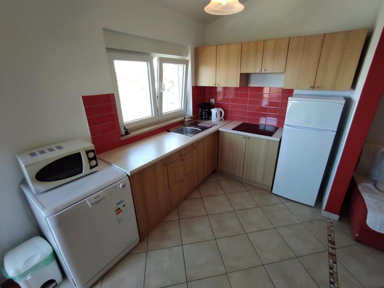 Kuchnia lub aneks kuchenny w obiekcie Apartment Lighthouse n3