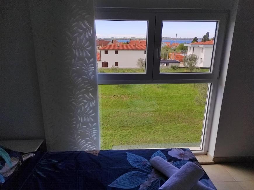 Łóżko lub łóżka w pokoju w obiekcie Apartment Lighthouse n3