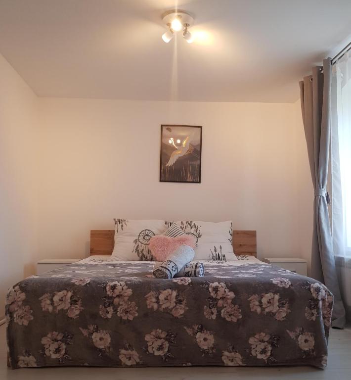 Posteľ alebo postele v izbe v ubytovaní Apartament Wiejska Sielanka