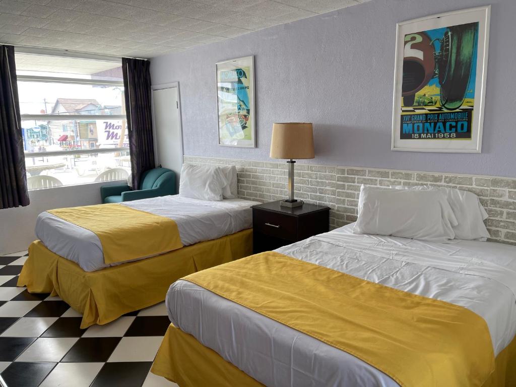 Voodi või voodid majutusasutuse Monaco Motel - Wildwood toas