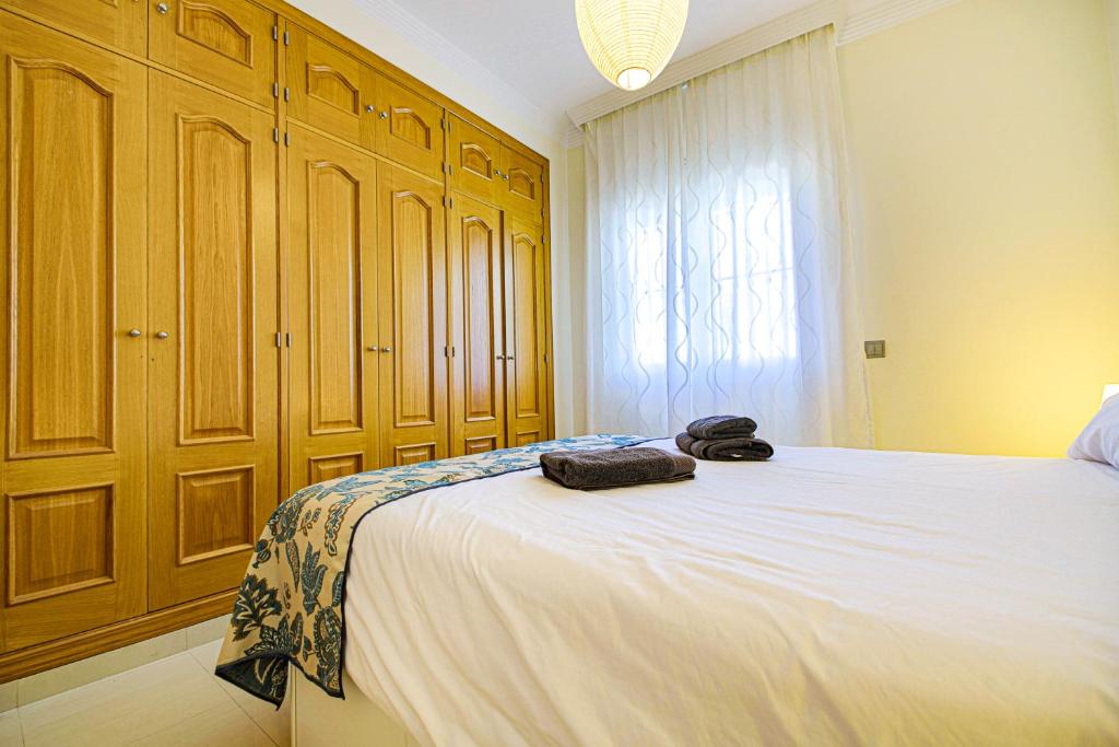 Postel nebo postele na pokoji v ubytování Estupendo apartamento con vistas al mar