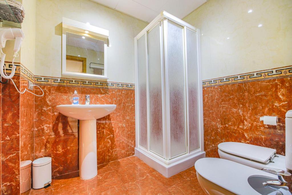 Koupelna v ubytování Estupendo apartamento con vistas al mar