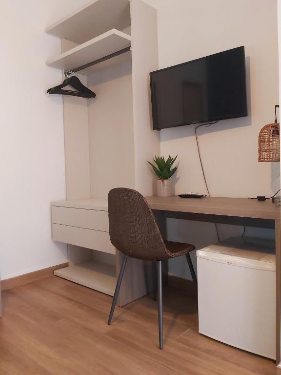 TV a/nebo společenská místnost v ubytování Bella Giulia
