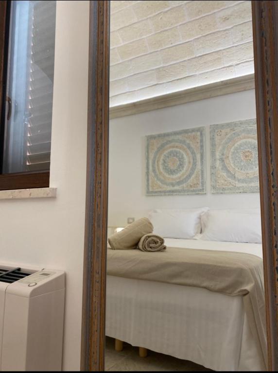 A bed or beds in a room at Sweet Home Suite