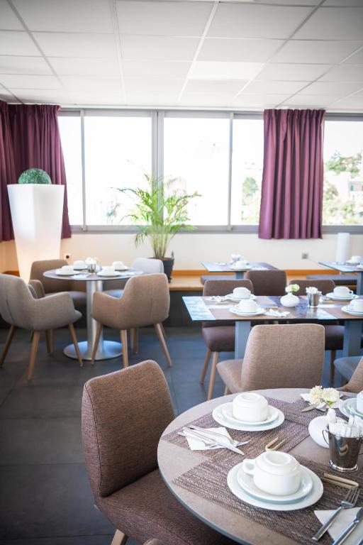 Posezení v ubytování Hotel Port Toga