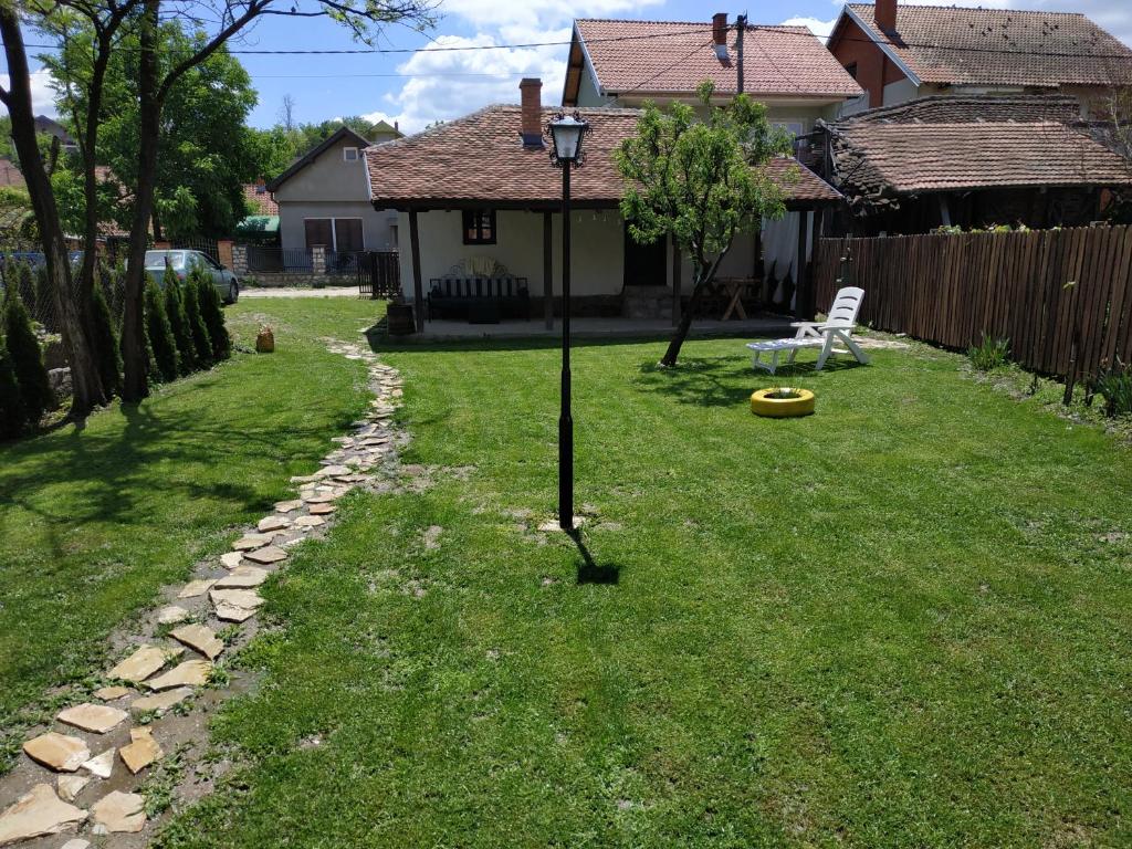 a lamp post in the yard of a house at STARA KOVAČNICA in Golubac