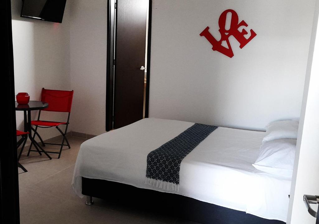 Postel nebo postele na pokoji v ubytování Apartamentos Las Piloneras