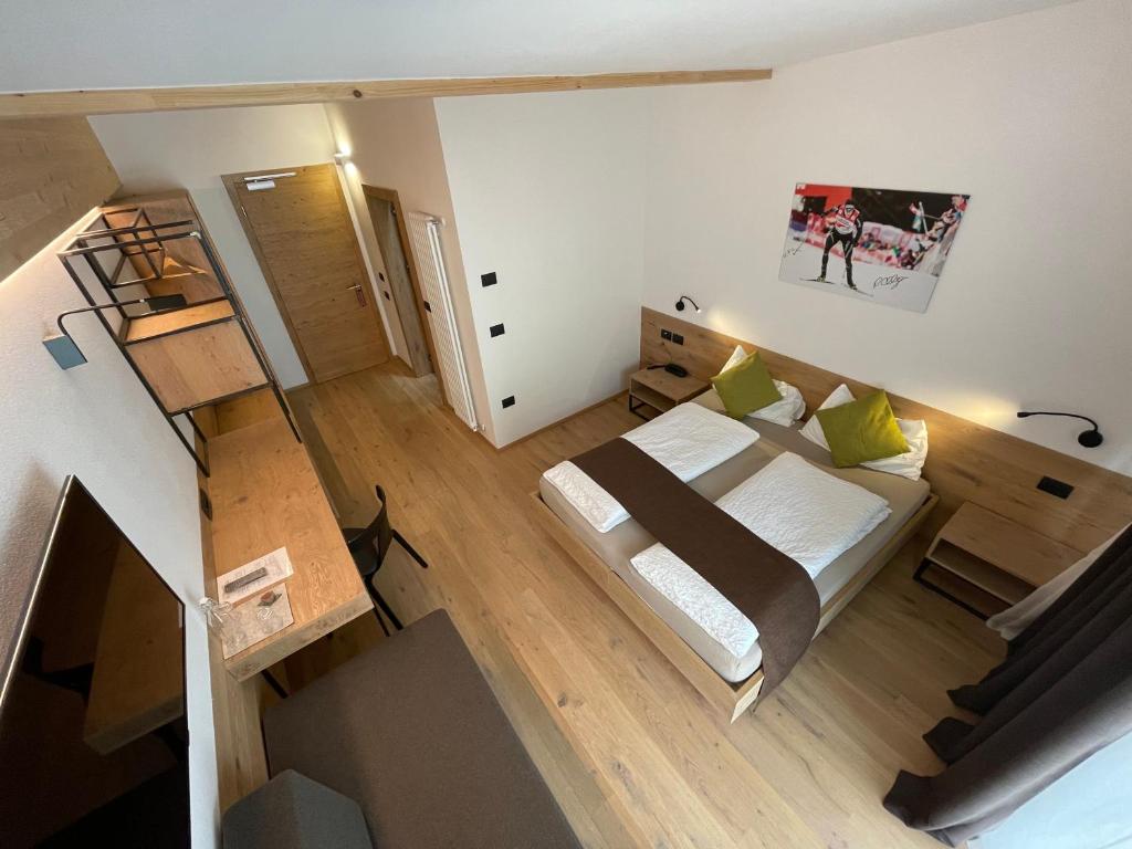 Postel nebo postele na pokoji v ubytování Active Hotel Rosat