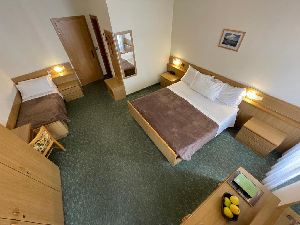 Postel nebo postele na pokoji v ubytování Active Hotel Rosat